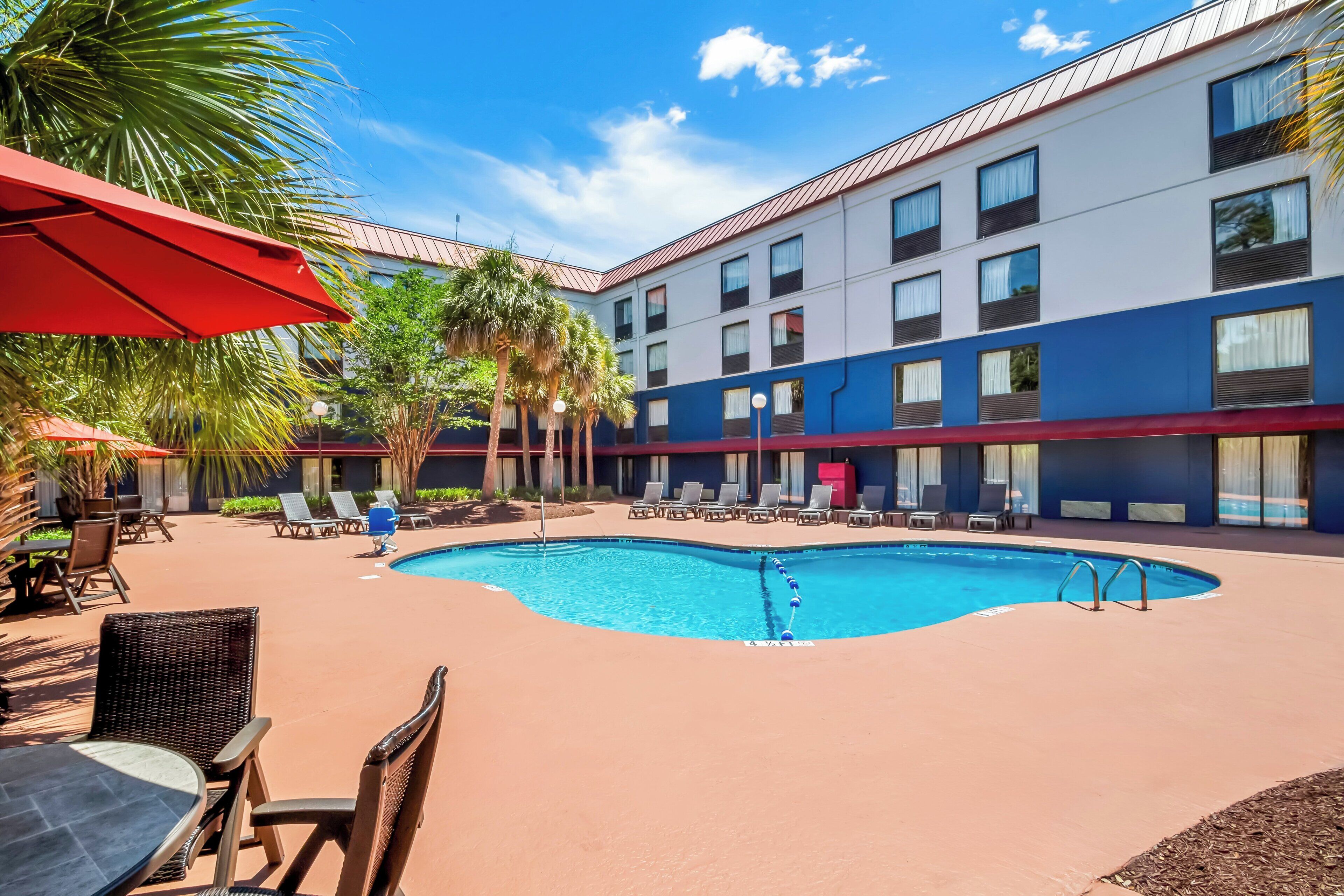 seasonal outdoor pool, open 9:00 am to 10:00 pm, pool umbrellas