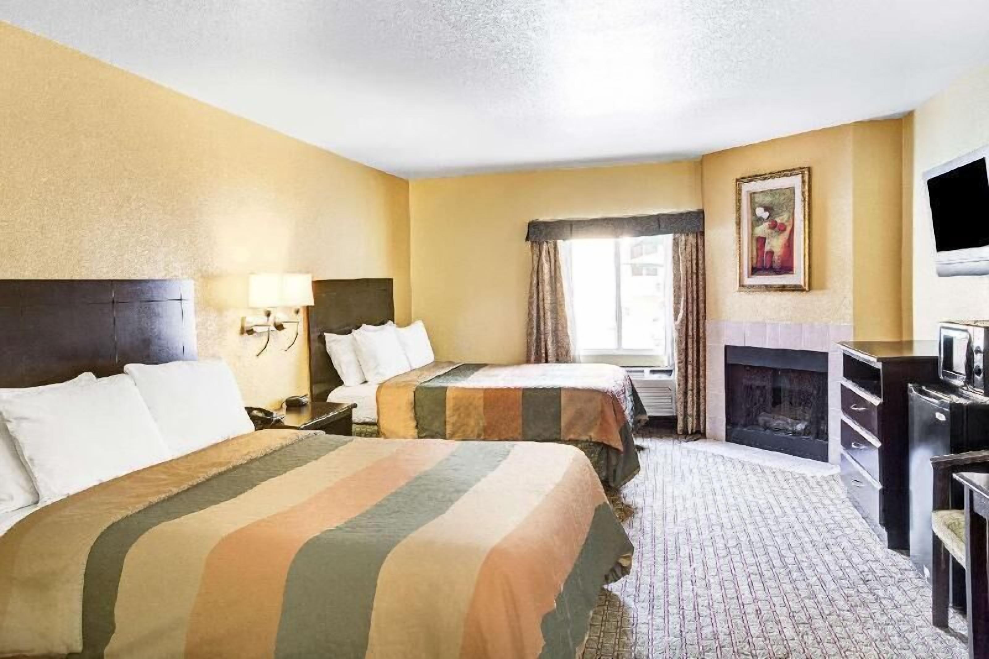 Premium bedding, pillow-top beds, desk, iron/ironing board