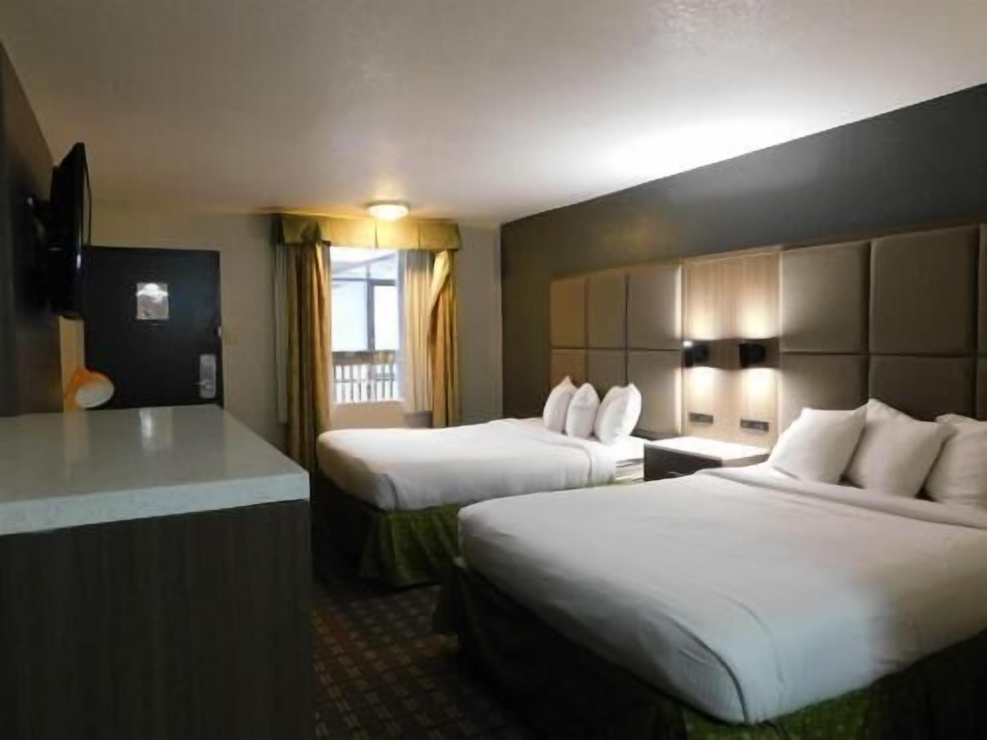 Premium bedding, pillow-top beds, desk, iron/ironing board