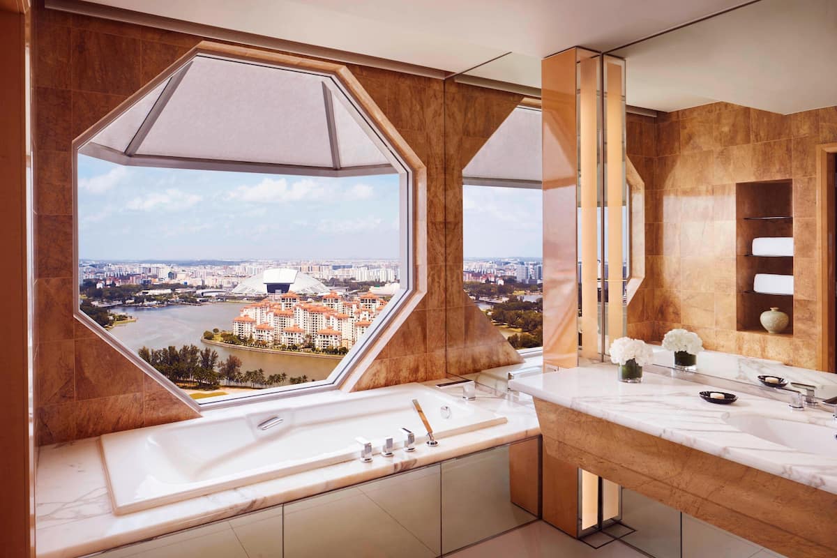 separate bathtub and shower, deep-soaking bathtub, rainfall showerhead