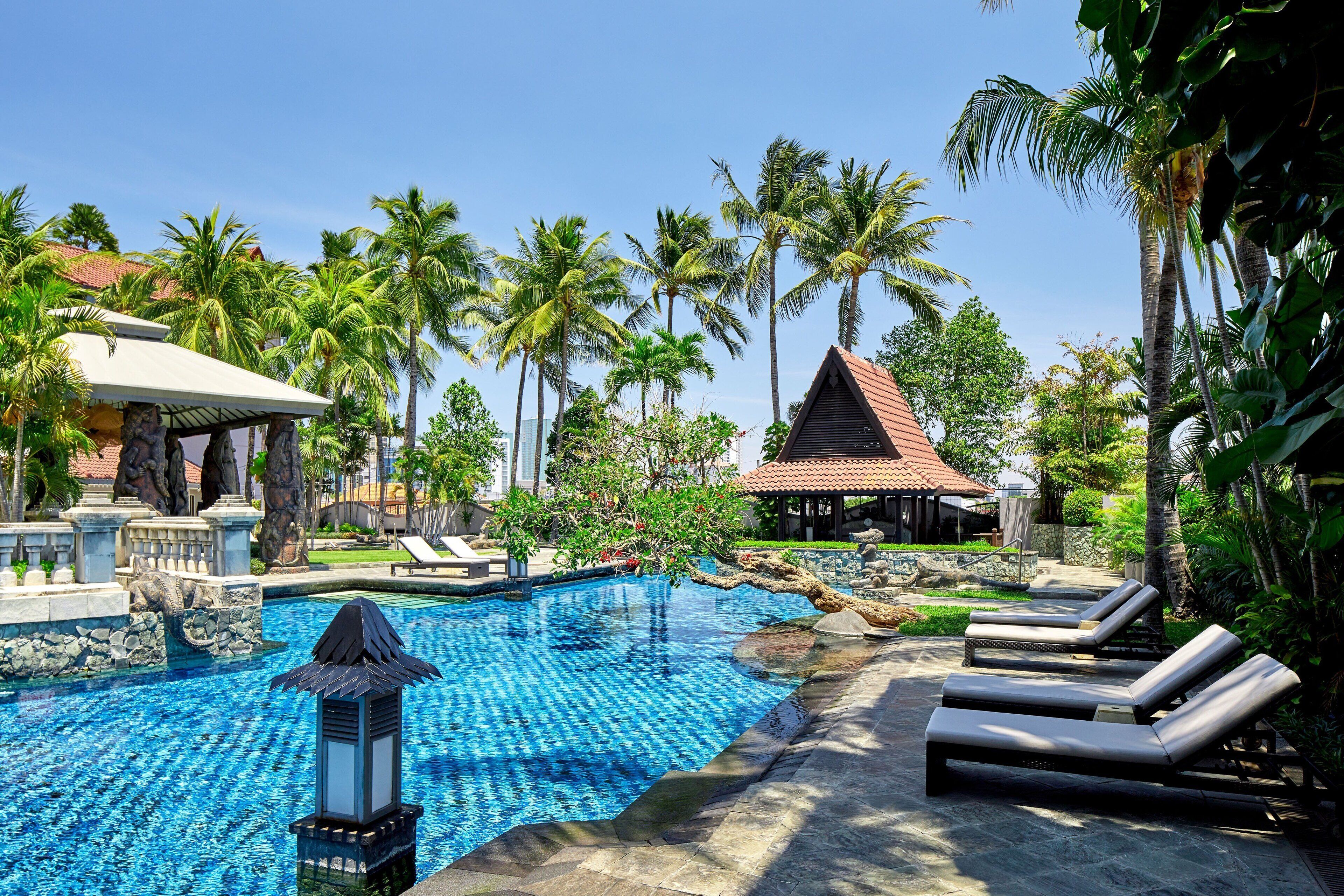 outdoor pool, pool umbrellas, pool loungers