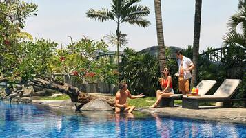 Outdoor pool, pool umbrellas, sun loungers