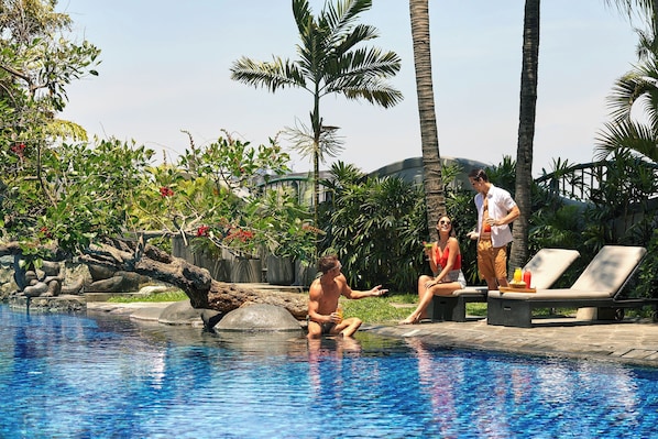Outdoor pool, pool umbrellas, pool loungers