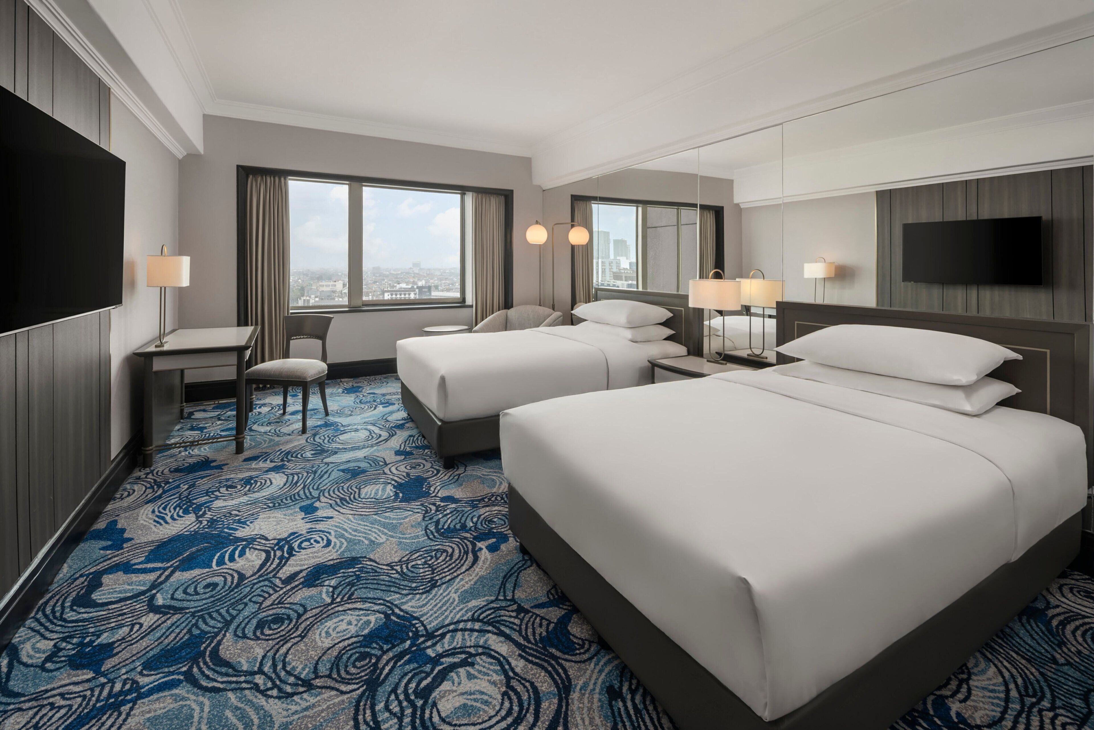 deluxe room, 2 double beds | 1 bedroom, premium bedding, minibar, in-room safe