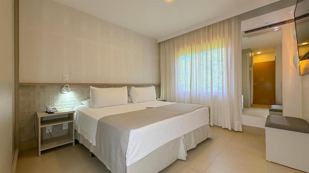 Apartamento luxo, 1 quarto | Frigobar (abastecido com alguns itens grátis), cofres nos quartos