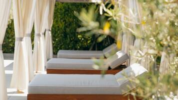 Outdoor pool, open 7:00 AM to 10:00 PM, cabanas (surcharge)