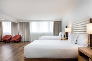 Hypo-allergenic bedding, in-room safe, desk, iron/ironing board at Luxe Sunset Boulevard Hotel