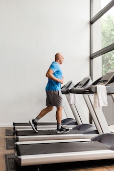 Fitness center at Luxe Sunset Boulevard Hotel