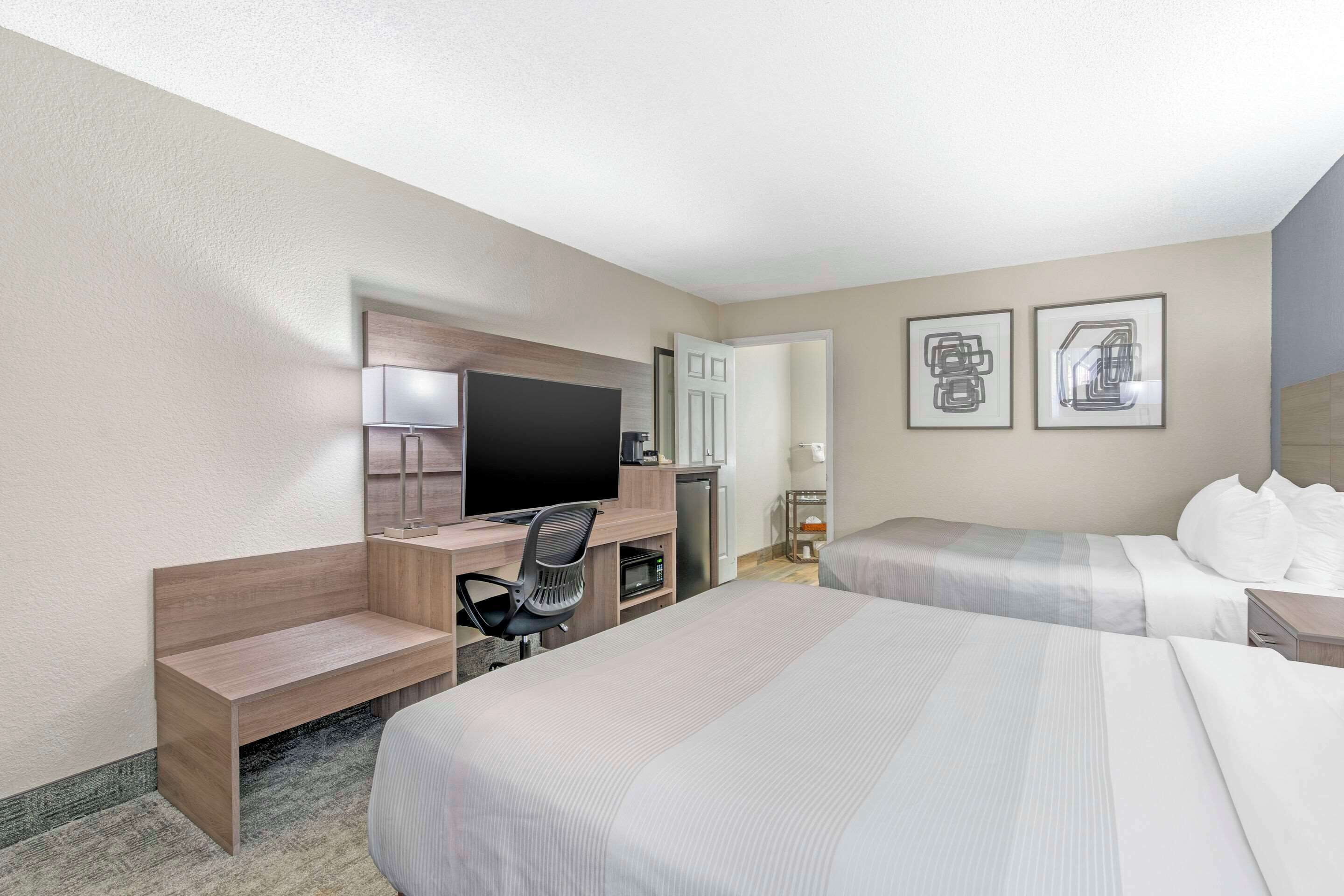 premium bedding, down duvets, pillow-top beds, blackout curtains