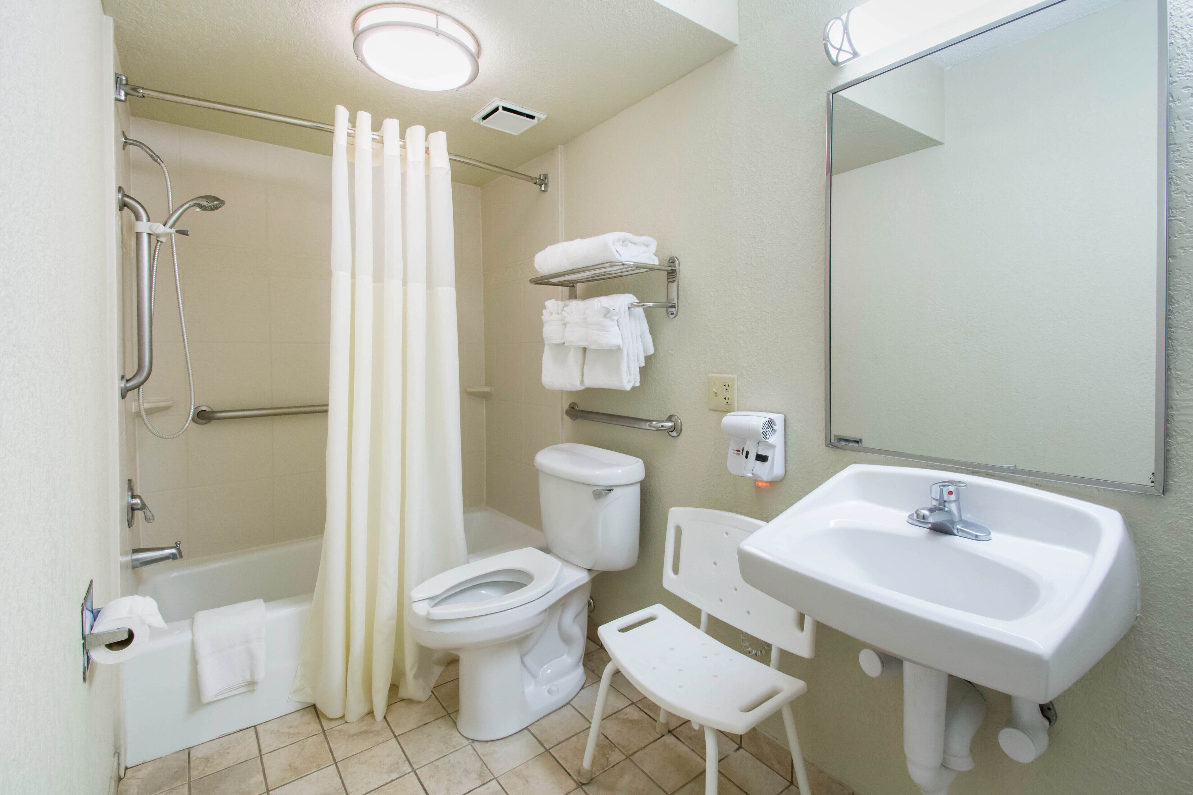 combined shower/bathtub, free toiletries, hair dryer, towels