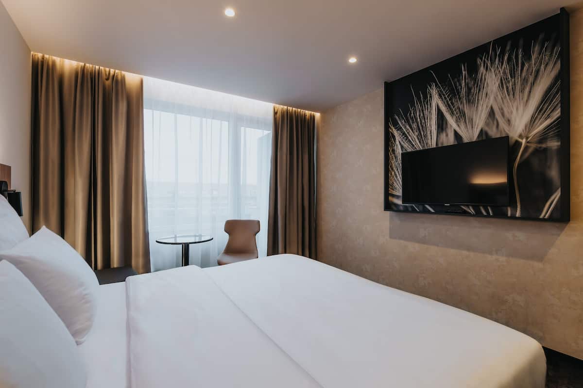 Klassieke kamer, 1 twee- of 2 eenpersoonsbedden, 2 eenpersoonsbedden | 1 slaapkamer, hypoallergeen beddengoed, een kluis op de kamer