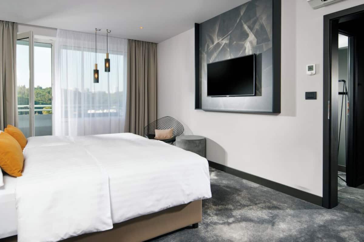 Executive suite | 1 slaapkamer, hypoallergeen beddengoed, een kluis op de kamer