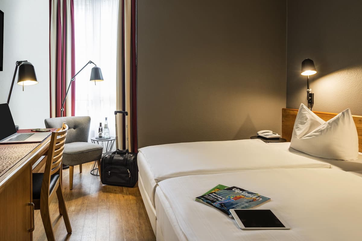 Premium bedding, pillow-top beds, in-room safe, individually furnished
