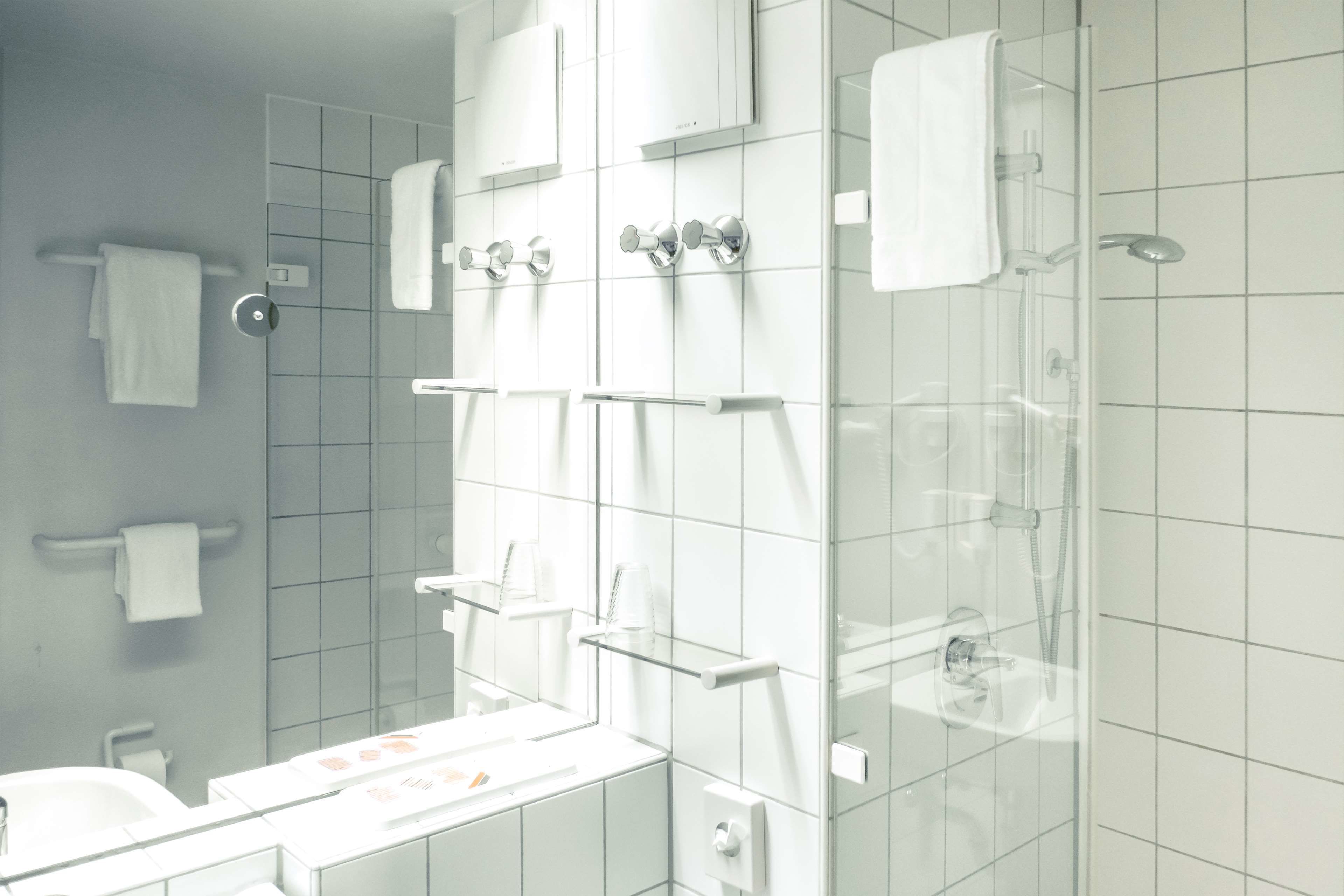 shower, eco-friendly toiletries, hair dryer, towels