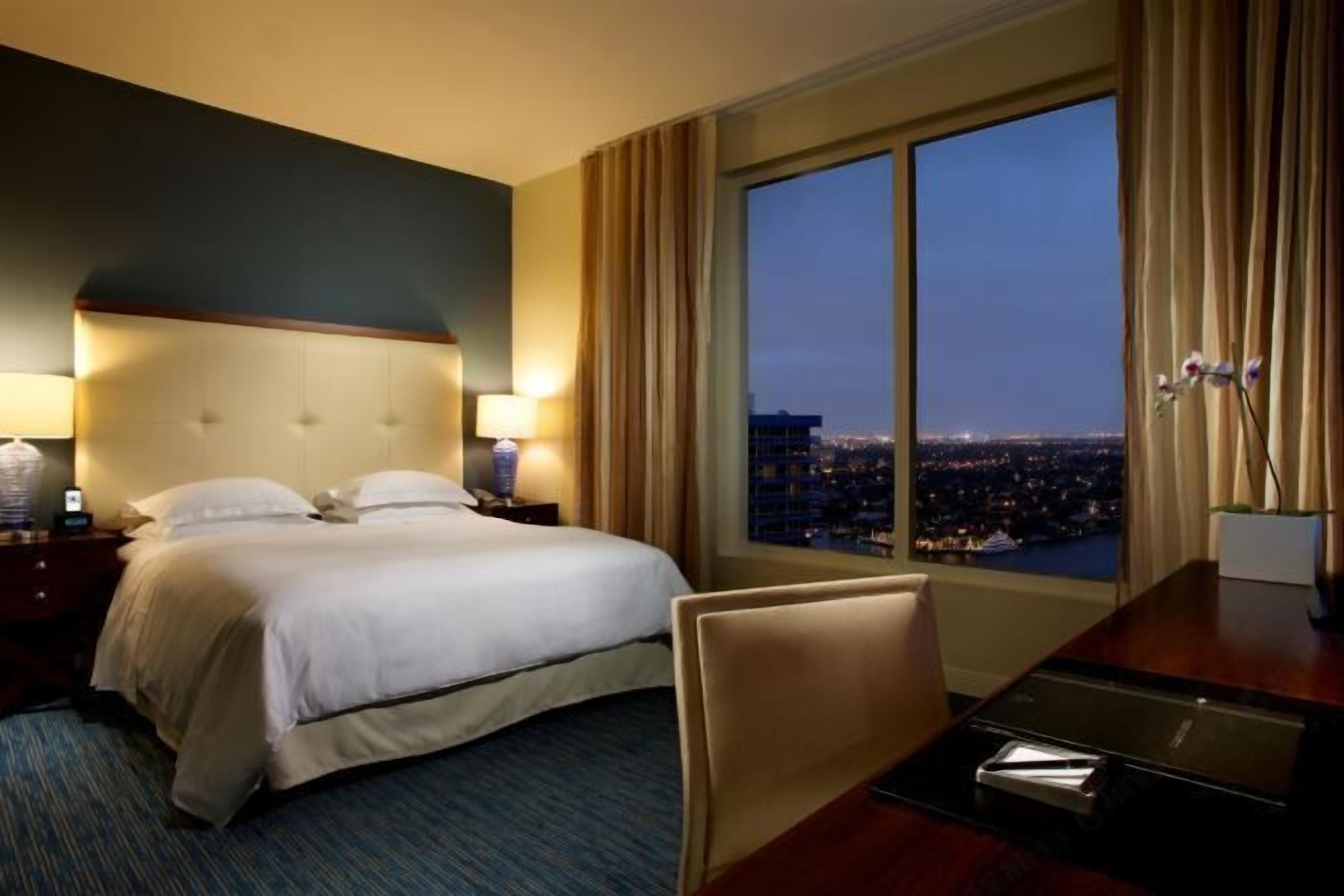 Premium bedding, pillow-top beds, in-room safe, desk