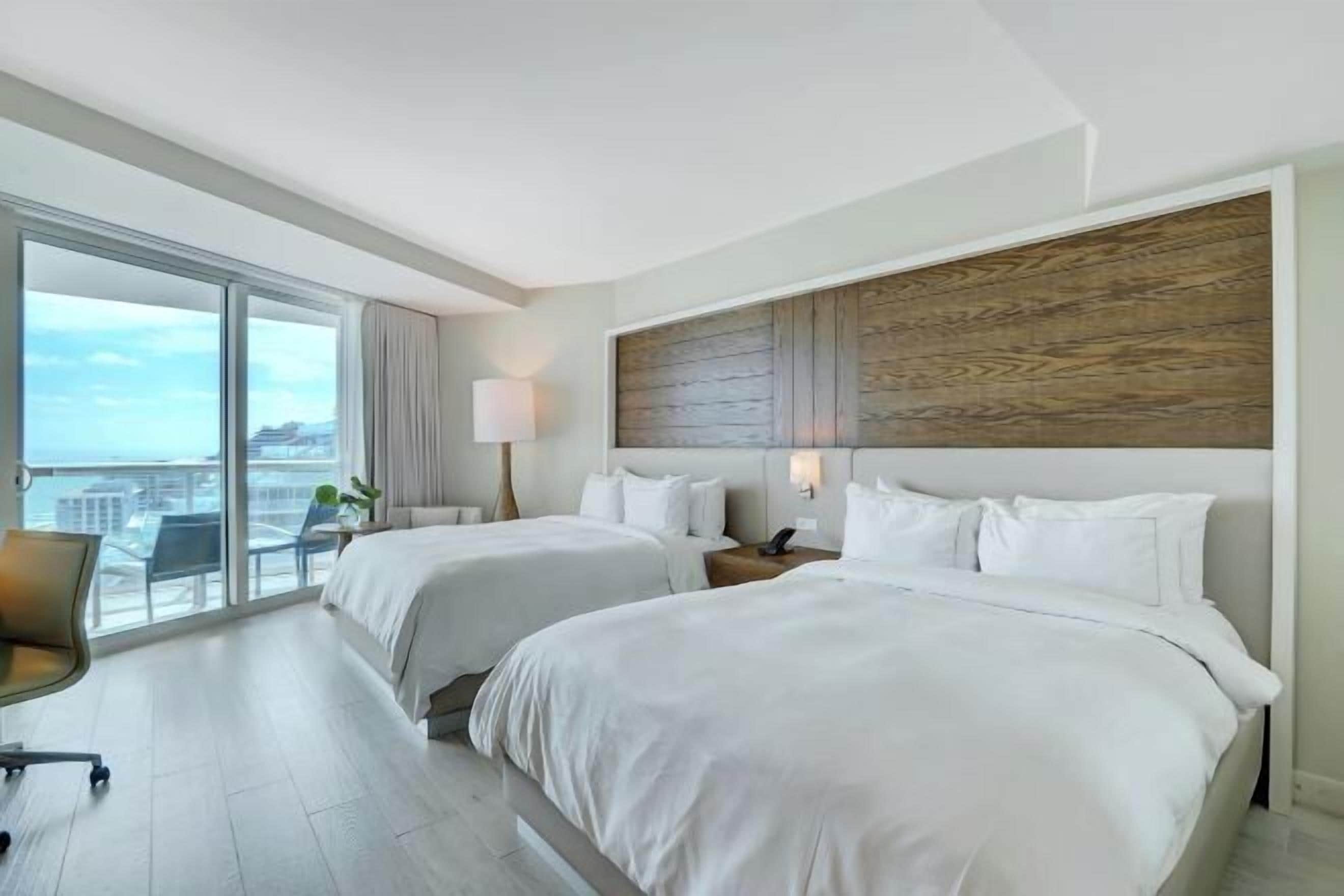 Premium bedding, pillow-top beds, in-room safe, desk