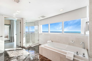 Suite, 2 Bedrooms | Bathroom | Designer toiletries, hair dryer, bathrobes, towels at Hilton Fort Lauderdale Beach Resort