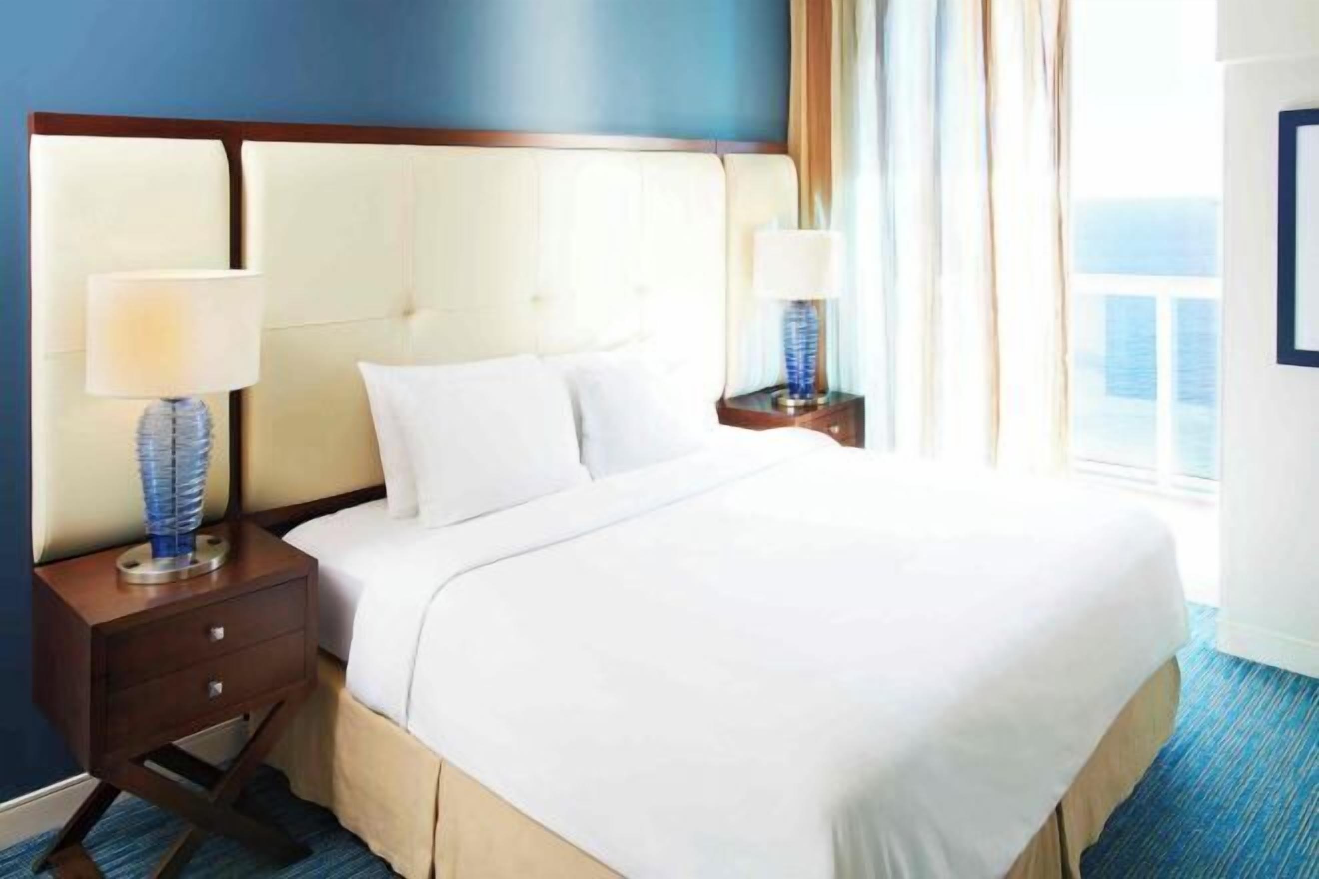 Premium bedding, pillow-top beds, in-room safe, desk