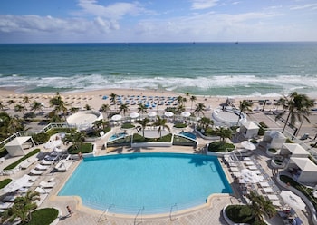 Outdoor pool, sun loungers at Beach House Fort Lauderdale, a Hilton Resort