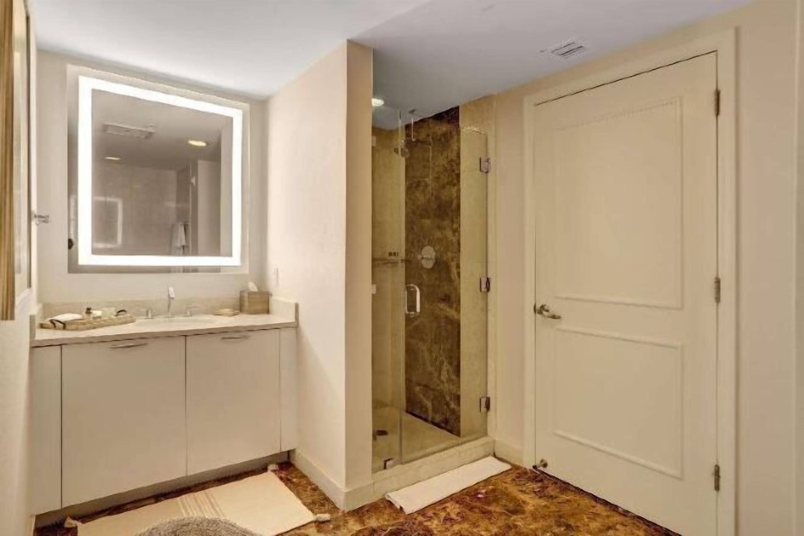 Bathroom | Designer toiletries, hair dryer, bathrobes, towels