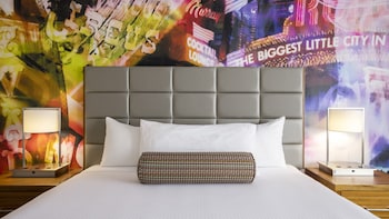LUXURY PREMIUM ROOM 1 KING NON-SMOKING | Laptop workspace, iron/ironing board, free WiFi, bed sheets at Circus Circus Hotel Casino Reno at THE ROW