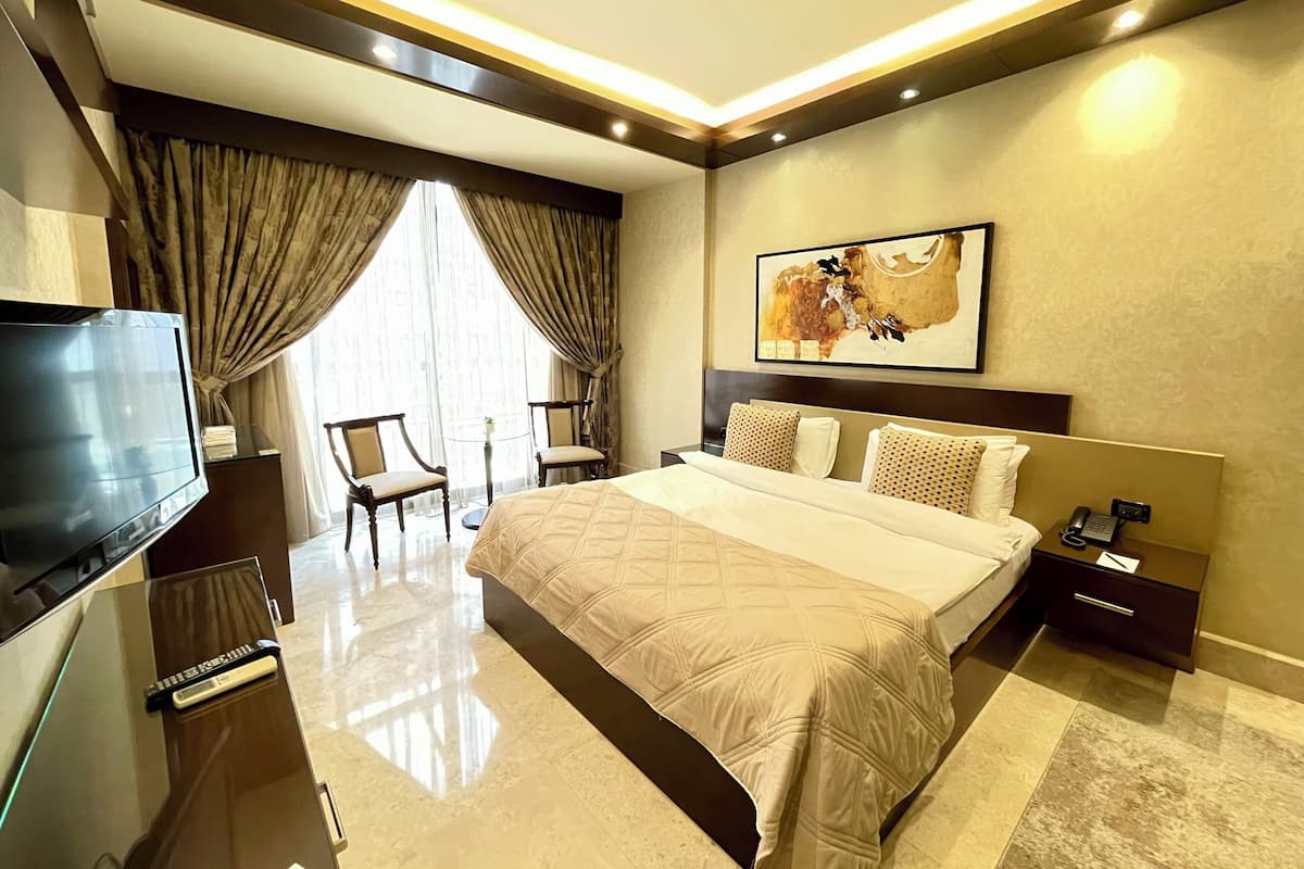 Suite Executive, 1 letto king, vista città | 1 camera, biancheria da letto di alta qualità, minibar