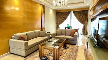 Presidential Suite, 2 Bedrooms, City View | Living area | Flat-screen TV, DVD player