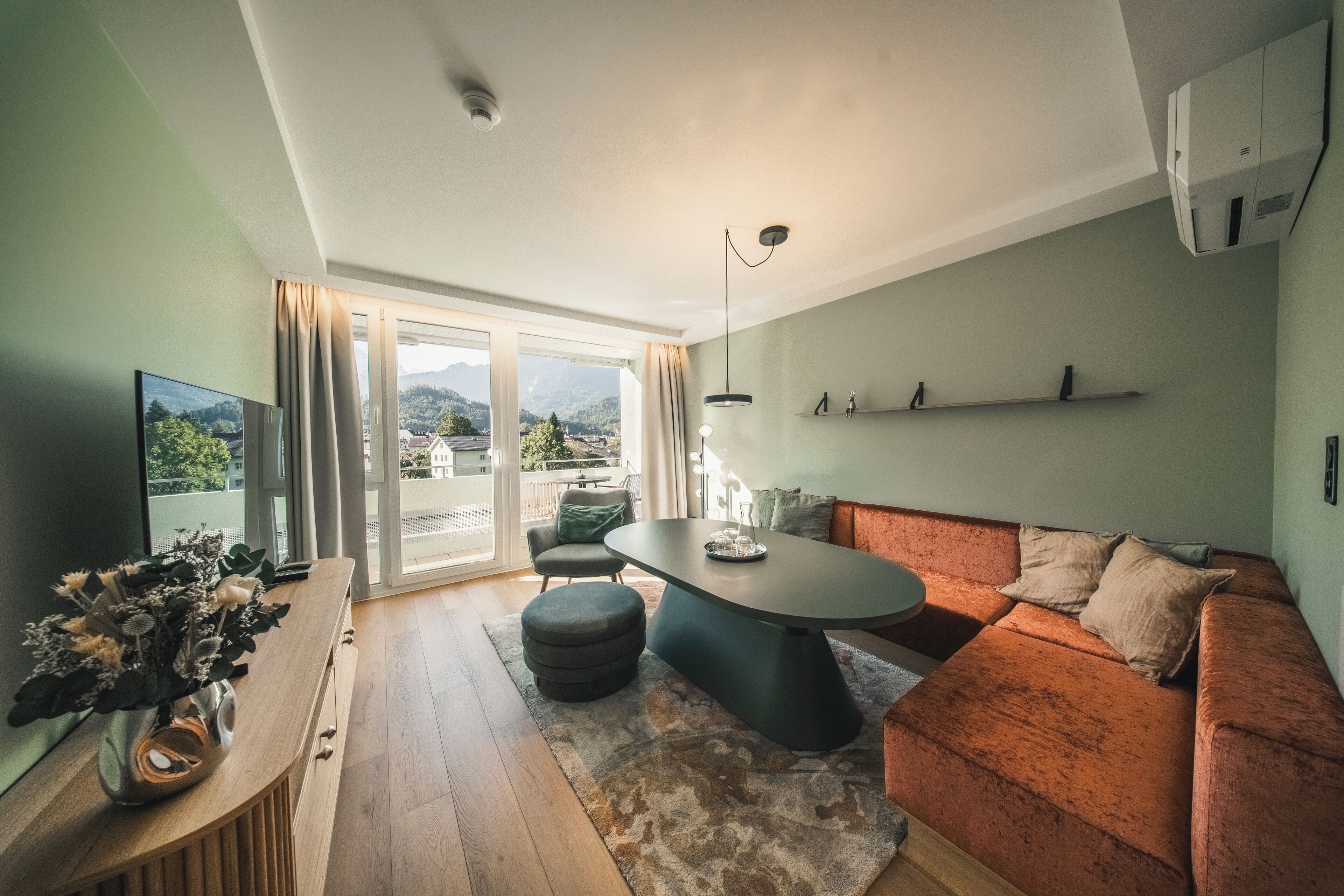 mate apartment 340 | living area | 55-inch flat-screen tv with cable channels, tv, netflix