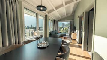 Loft Suite 580 | Living area | 55-inch flat-screen TV with cable channels, TV, Netflix