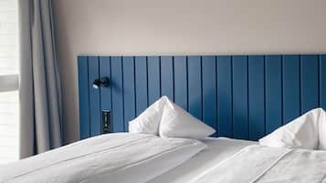 2 bedrooms, hypo-allergenic bedding, down comforters, in-room safe