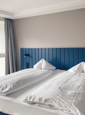 2 bedrooms, hypo-allergenic bedding, down duvets, in-room safe