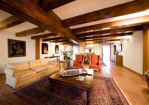 Presidential Suite, 1 King Bed | Living area | 32-inch LED TV with cable channels, TV