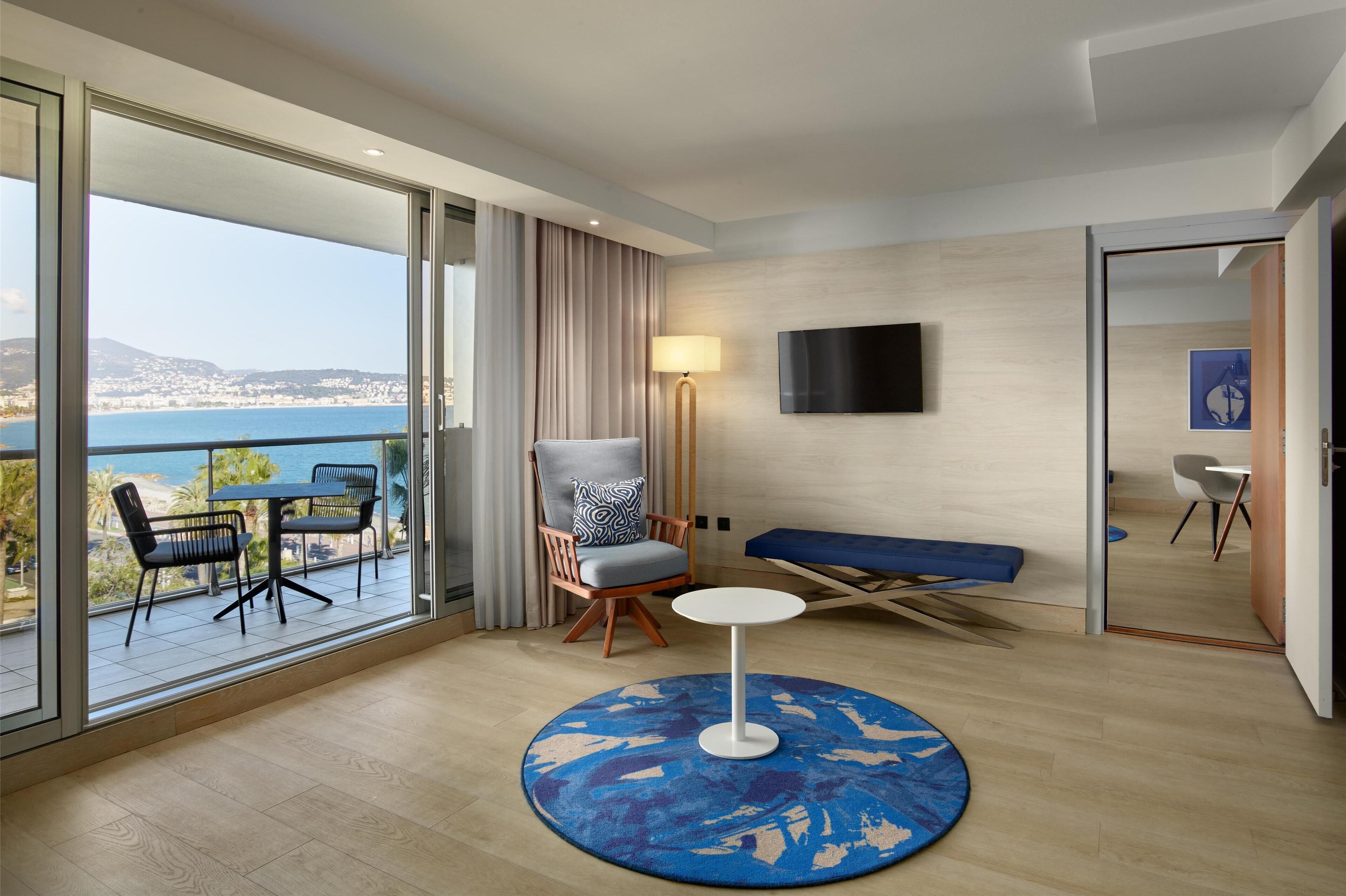 junior suite, terrace (bay view) | in-room safe, desk, laptop workspace, soundproofing