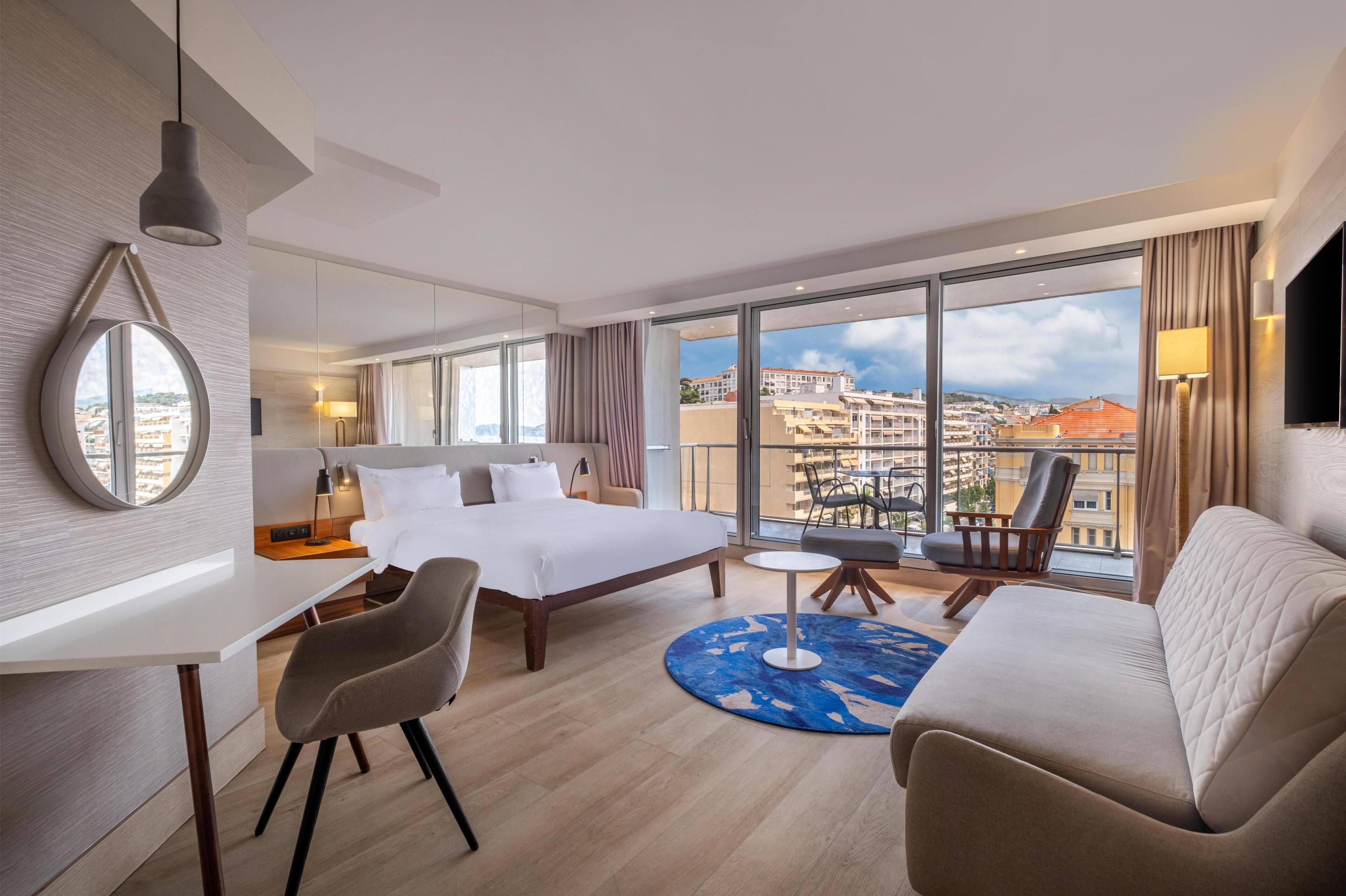 Junior Suite, Terrace (Bay View) | In-room safe, desk, laptop workspace, soundproofing