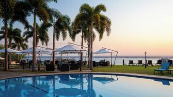 Outdoor pool, pool umbrellas, sun loungers