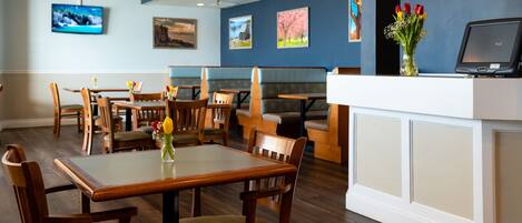 Breakfast, lunch, dinner served; local cuisine