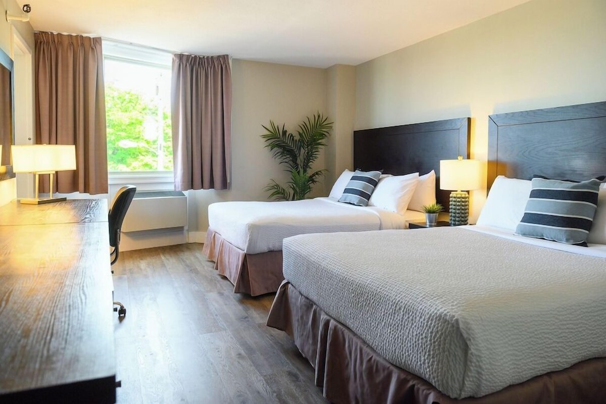 Premium bedding, desk, blackout drapes, iron/ironing board