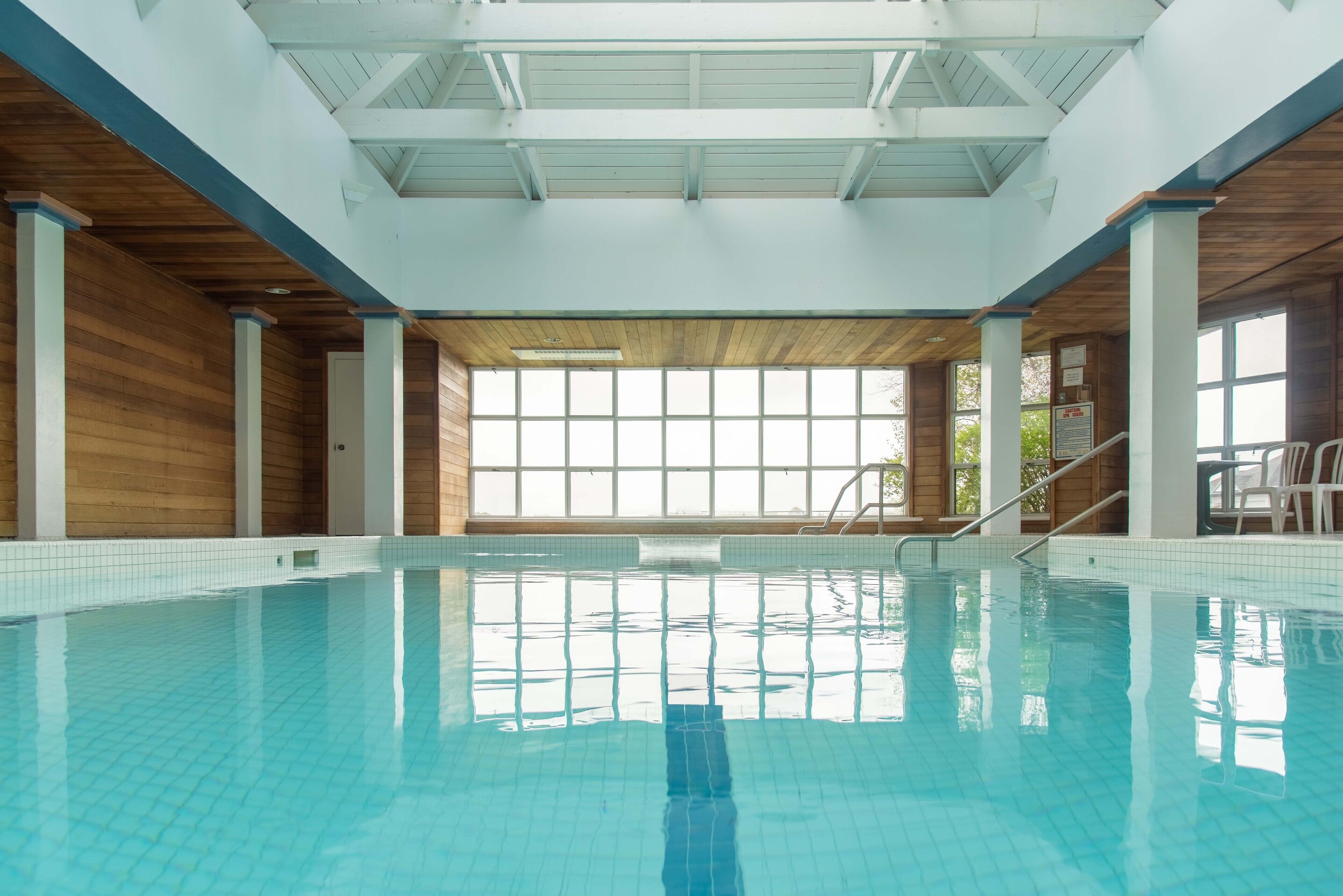 indoor pool, outdoor pool, pool loungers