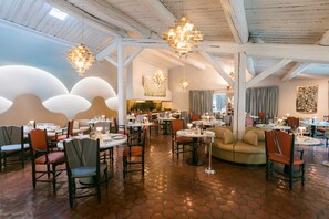 Lunch, dinner served; Mediterranean cuisine, garden views 