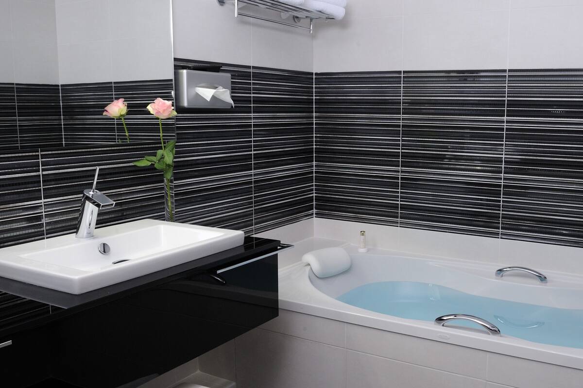 comfort room | bathroom | free toiletries, hair dryer, bathrobes, slippers