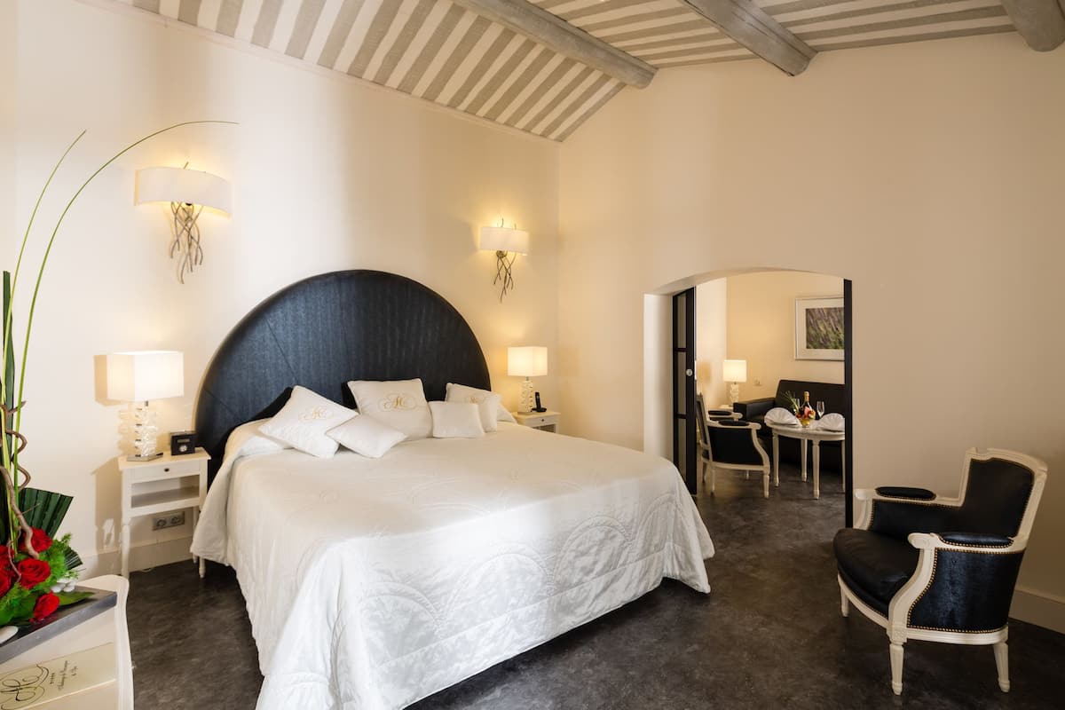 Suite, Garden View | 1 bedroom, premium bedding, minibar, in-room safe