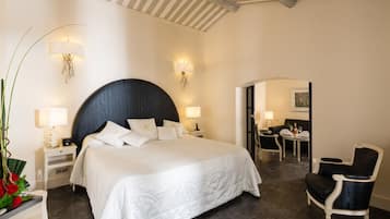 Suite, Garden View | Premium bedding, minibar, in-room safe, desk