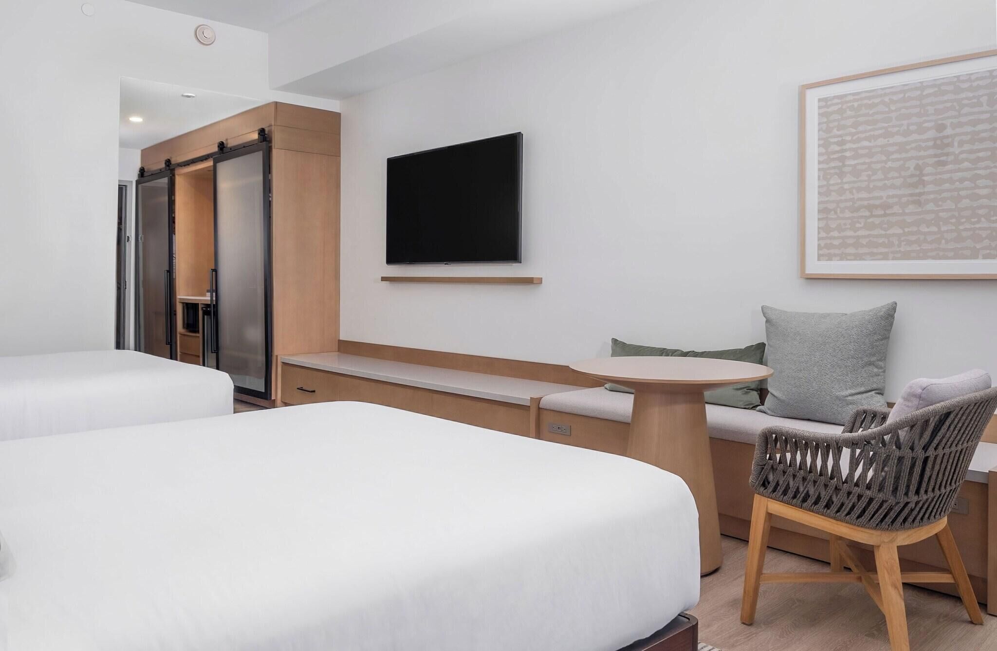 Premium bedding, pillow-top beds, in-room safe, laptop workspace
