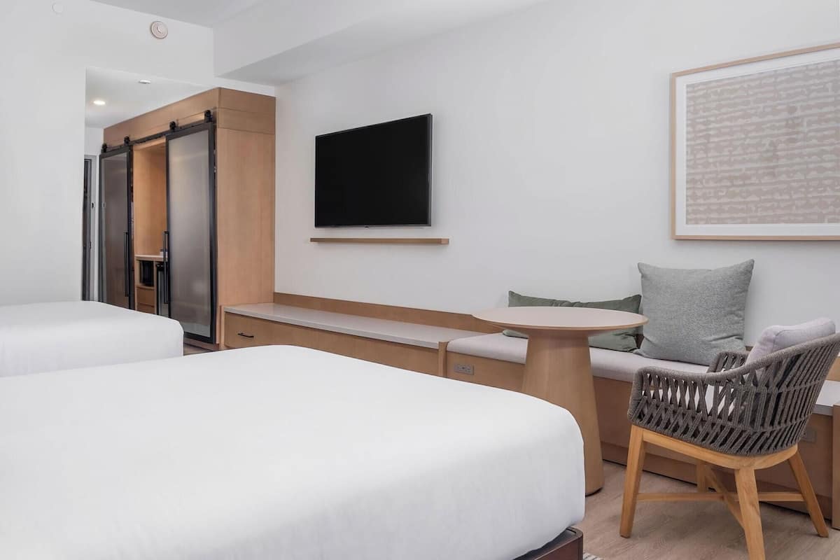 Premium bedding, pillow-top beds, in-room safe, laptop workspace