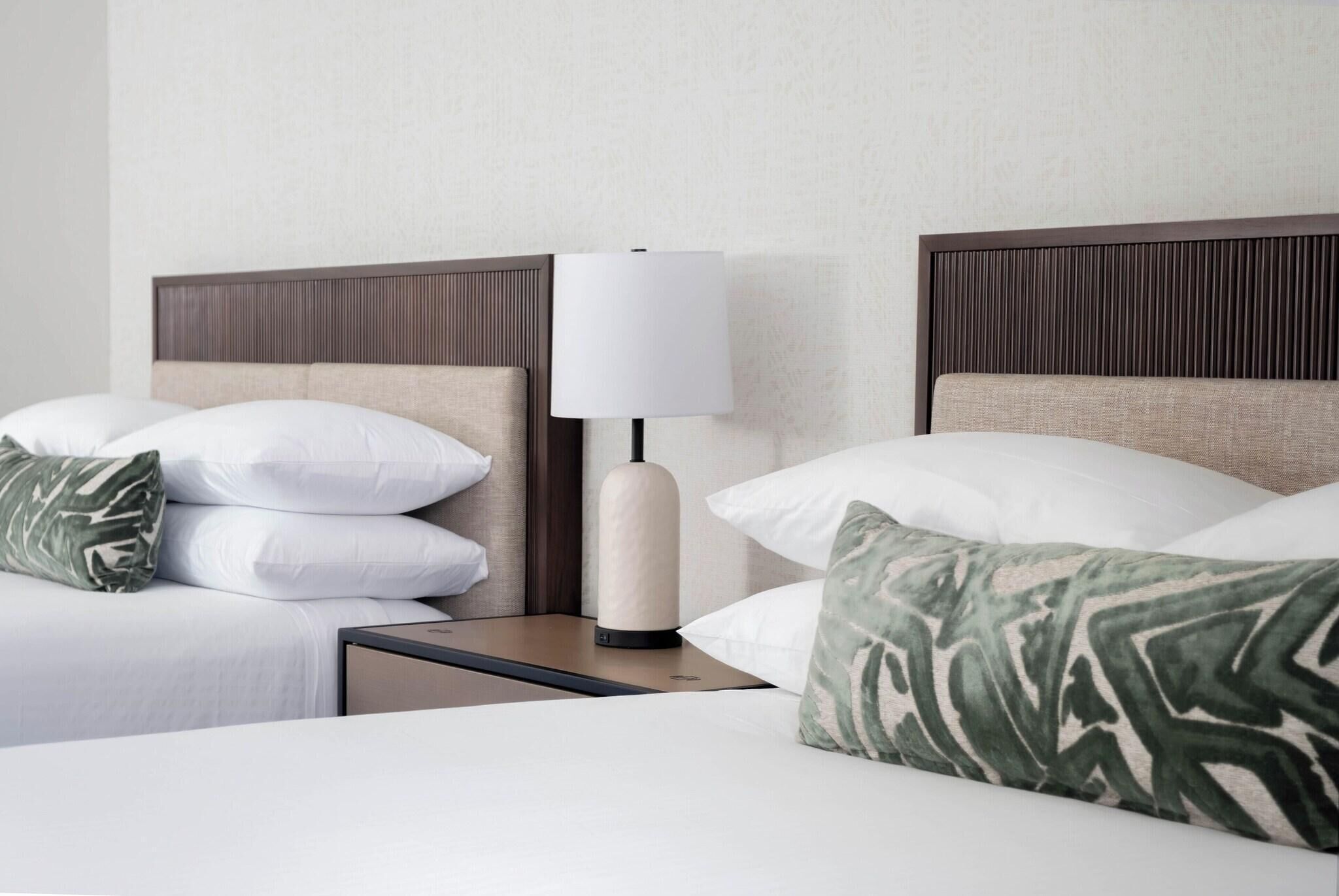 Premium bedding, pillow-top beds, in-room safe, laptop workspace