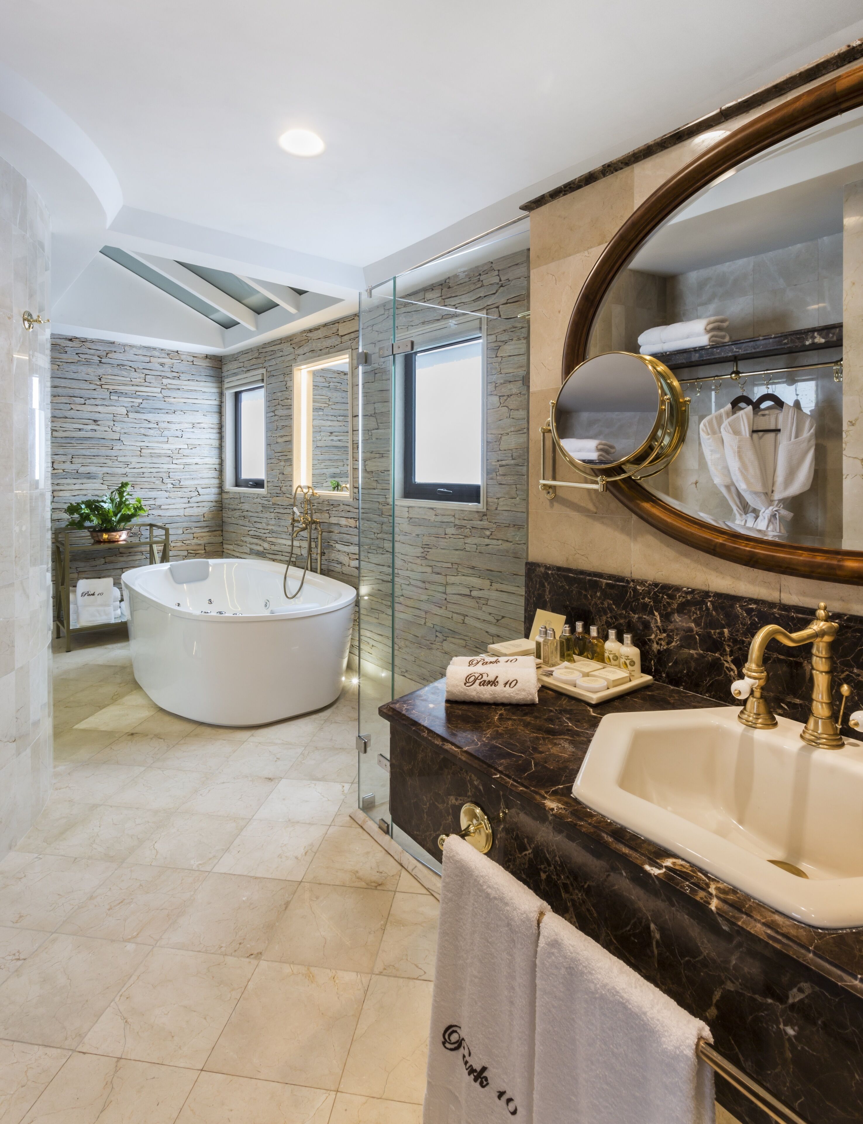 presidential suite | bathroom | designer toiletries, hair dryer, bathrobes, slippers