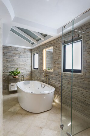Presidential Suite | Bathroom | Designer toiletries, hair dryer, bathrobes, slippers