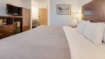 Desk, blackout drapes, iron/ironing board, bed sheets