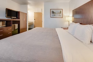 Desk, blackout drapes, iron/ironing board, bed sheets