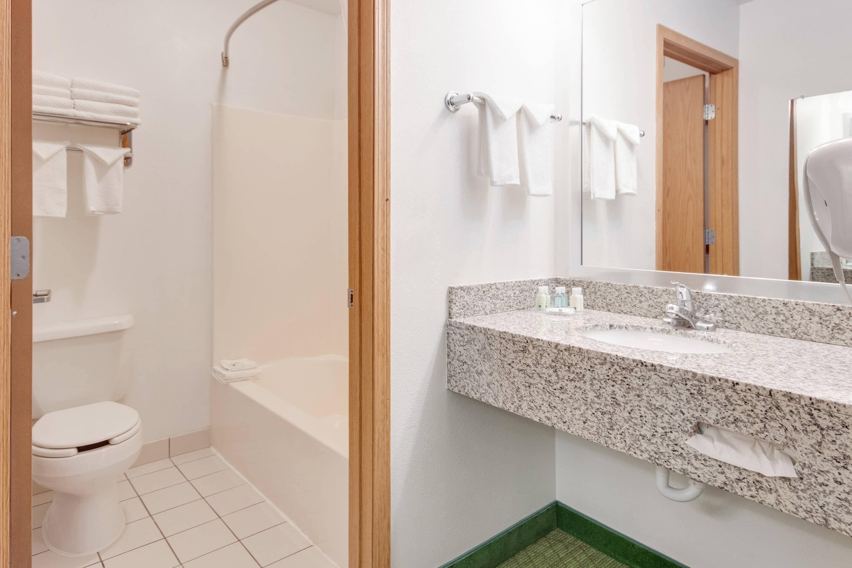 desk, blackout curtains, iron/ironing board, bed sheets